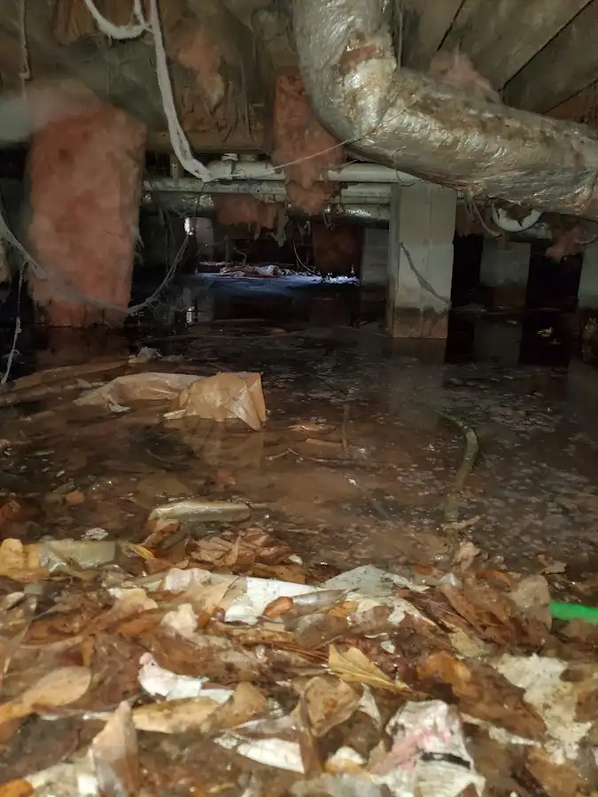 Crawl space flood assessment for Commercial Water Damage Restoration in Spencer