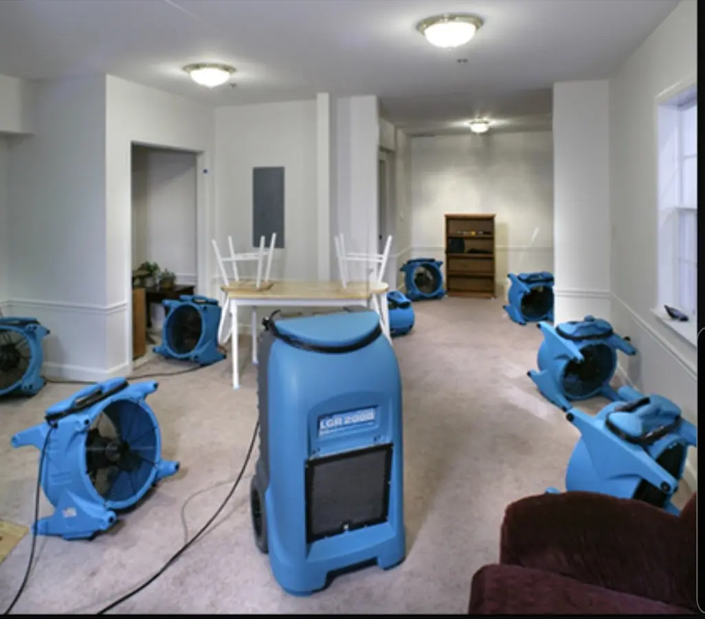 Air movers and dehumidifier setup for Water Extraction & Removal in Spencer